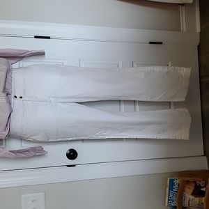 White boot leg dress pant with double gold button waist design